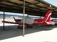 N684CM @ CCB - Covered up, tied down and parked in the shade - by Helicopterfriend