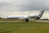 N332MM @ EGGW - Gulfstream Aerospace GV-SP (G550), c/n: 5283 at Luton - by Terry Fletcher