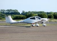 G-CFJN @ EGFH - Atlantic Flight Training's Diamond Star taxing prior to departure - by Roger Winser