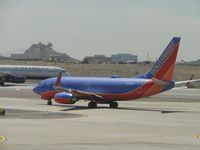 N495WN @ PHX - Taxiing for take off at runway 25R - by Helicopterfriend