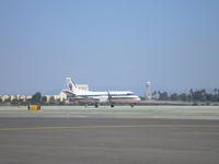 N392AE @ KLAX - Taxiing for departure - by Nick Taylor Photography