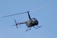 PH-WPW @ EHAM - R44 over the Panorama terrace - by Chris Hall