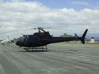 N777 @ POC - Shinny black helicopter in transient parking - by Helicopterfriend