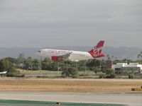 N529VA @ LAX - Landing on runway 24R - by Helicopterfriend