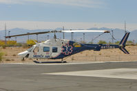 N415MA @ NV40 - 1988 Bell 222U, c/n: 47568 at Action Helipad - just south of Las Vegas - by Terry Fletcher