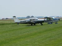 N8145P @ O74 - Parked in the grass at Mt. Victory, Ohio - by Bob Simmermon