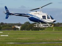 VH-LLA @ YMMB - Bell 206 Jetranger hovering over the helipad at Moorabbin