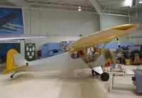 N28118 @ KPSP - Piper J3L-65 Cub, being restored at the Palm Springs Air Museum, Palm Springs CA - by Ingo Warnecke