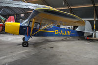 G-AJIH @ EGAD - Parked in the hangar - by Robert Kearney