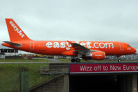 G-EZUI @ EGGW - 2011 Airbus A320-214, c/n: 4721 in Easyjet reverse colour scheme  - evoking memories of the late 1970s and Braniff's Big Orange out of London Gatwick - by Terry Fletcher
