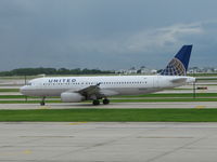 N438UA @ ORD - United Airbus A320-232 taxiiing at Chicago O'hare Airport - by David Burrell