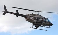 N175MS - Bell 206 leaving Heliexpo Orlando