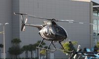 N369WM - Hughes 369D leaving Heliexpo Orlando - by Florida Metal