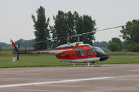 162677 @ KDVN - Parked on runway - by Glenn E. Chatfield