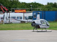 G-BYIE @ EGTB - Robinson R22 Beta at Wycombe Air Park - by moxy