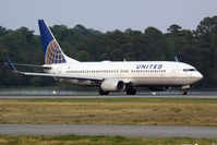 N17229 @ ORF - United Airlines (Continental Airlines) N17229 (FLT COA800) on takeoff roll on RWY 23 en route to Newark Liberty Int'l (KEWR). This flight was diverted to Norfolk and gated for nearly 2-1/2 hrs before to continuing to Newark. - by Dean Heald
