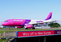 HA-LWL @ EGGW - Wizzair - by Chris Hall