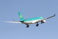 EI-ELA @ KORD - Air Lingus Airbus A330-302X, EIN125 arriving from Dublin/EIDW, on the missed approach RWY 14R KORD. - by Mark Kalfas