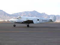 N122GS @ KELP - Franklin Mountains in El Paso behind the Beech - by Stuart Williams