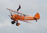 N707TJ @ EGFH - Winner of Wingwalking competition takes to the air. - by Roger Winser