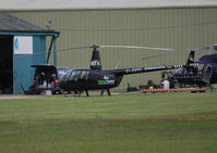 G-SEFI @ EGLD - Robinson R44 Raven II, ex N75271 at Denham - by moxy