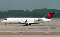 N437SW @ KMSP - SkyWest CRJ flying for Delta Connection taxies at MSP. - by Daniel L. Berek