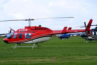 G-CDYR @ EGBT - being used for ferrying race fans to the British F1 Grand Prix at Silverstone - by Chris Hall