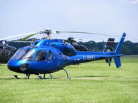 G-NBEL @ EGBT - being used for ferrying race fans to the British F1 Grand Prix at Silverstone - by Chris Hall