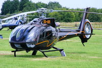 OO-ARI @ EGBT - being used for ferrying race fans to the British F1 Grand Prix at Silverstone - by Chris Hall