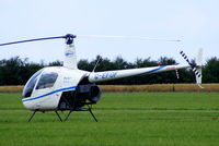 G-EFOF @ EGBT - being used for ferrying race fans to the British F1 Grand Prix at Silverstone - by Chris Hall