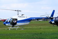 G-BLGV @ EGBT - being used for ferrying race fans to the British F1 Grand Prix at Silverstone - by Chris Hall