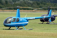 G-RWEW @ EGBT - being used for ferrying race fans to the British F1 Grand Prix at Silverstone - by Chris Hall