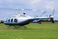 G-ODCC @ EGBT - being used for ferrying race fans to the British F1 Grand Prix at Silverstone - by Chris Hall