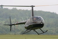 G-GRZZ @ EGTB - being used for ferrying race fans to the British F1 Grand Prix at Silverstone - by Chris Hall
