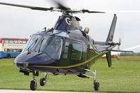G-IFRH @ EGTB - being used for ferrying race fans to the British F1 Grand Prix at Silverstone - by Chris Hall