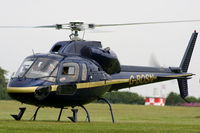 G-BOSN @ EGTB - being used for ferrying race fans to the British F1 Grand Prix at Silverstone - by Chris Hall