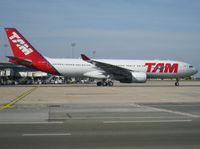 PT-MVT @ LFPG - TAM's fleet members are termed as Red Magic Carpets and when taking the shapes of A330-200s, they can accomodate 223 guests in First (4 seats), Business (36) and Economy (183) - by Alain Durand