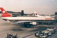 HB-IWM @ NRT - Swissair - by Henk Geerlings
