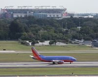 N515SW @ TPA - Southwest with Bucs stadium in back - by Florida Metal