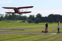 N14073 @ 42I - Departing the EAA fly-in at Zanesville, Ohio - by Bob Simmermon