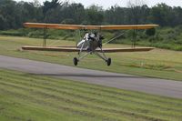 N26476 @ 42I - Departing the EAA fly-in at Zanesville, Ohio. - by Bob Simmermon