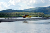 N2588P - 1955 Piper PA18-150 N2588P landing on a sand bar in the Tanana River - Fairbanks, AK - by scotch-canadian