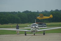 N38491 @ KICL - Just before touchdown at the Midwest smallest airport with Harry Barr at the controls - by Floyd Taber