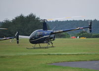 G-BXXN @ EGTB - Robinson R22 Beta II at Wycombe Air Park - by moxy