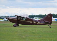 G-WAGN @ EGLM - Stinson 108-3 Flying Station Wagon departing White Waltham. - by moxy