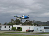 N8667H @ SZP - 1947 North American NAVION, Continental IO-520 285 Hp upgrade, on final Rwy 04 with Young Eagles riders - by Doug Robertson