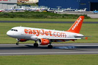 G-EZIO @ EGGP - easyJet A319 touching down on RW27, taken from the control tower - by Chris Hall