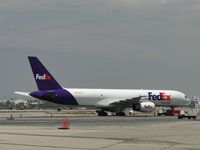 N913FD @ ONT - Spare Fed Ex ship, parked off to the side until needed - by Helicopterfriend