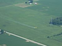 UNKNOWN - Crop duster flying under power lines in northern Indiana. - by Bob Simmermon
