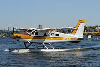 N9744T @ W55 - Kenmore Beaver taxiis in to Kenmore Lake Union's facility with a comany Turbo Otter right behind it - by Duncan Kirk